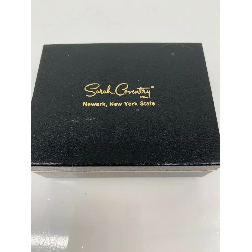 Sarah Coventry features 	•
